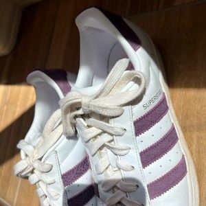 Adidas Superstar sneakers w/purple stripes